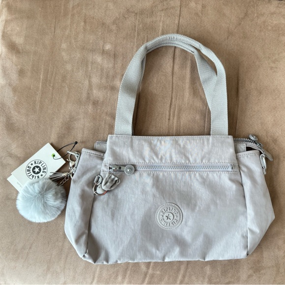 Kipling Handbags - NWT Kipling Satchel with Pom Pom bag charm